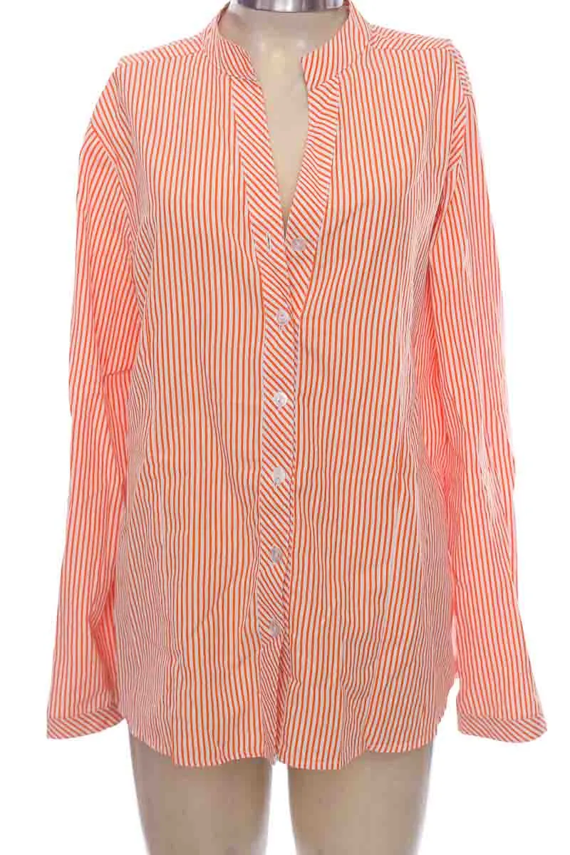 BLUSA COLOR NARANJA  ARTE Y DISEñO