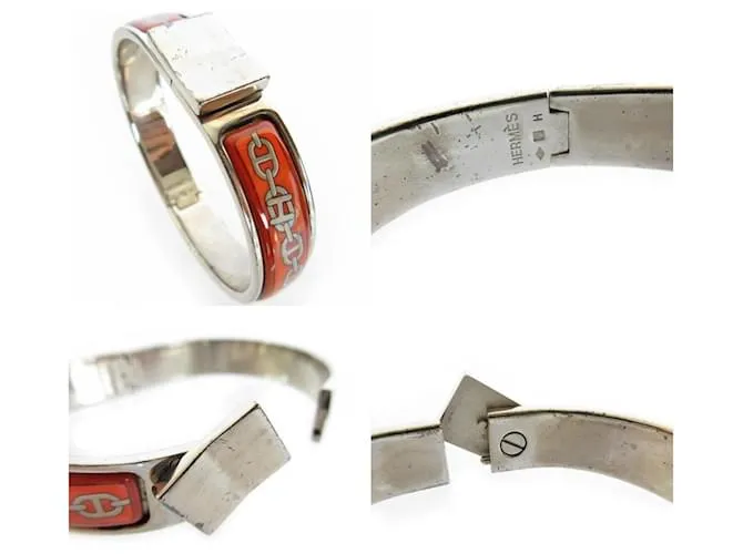 Brazalete de esmalte naranja y plata de Hermès 