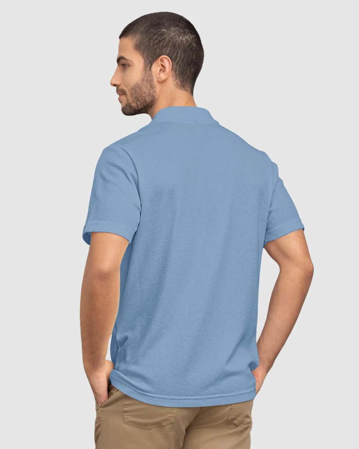 Camiseta tipo polo con bolsillo en frente