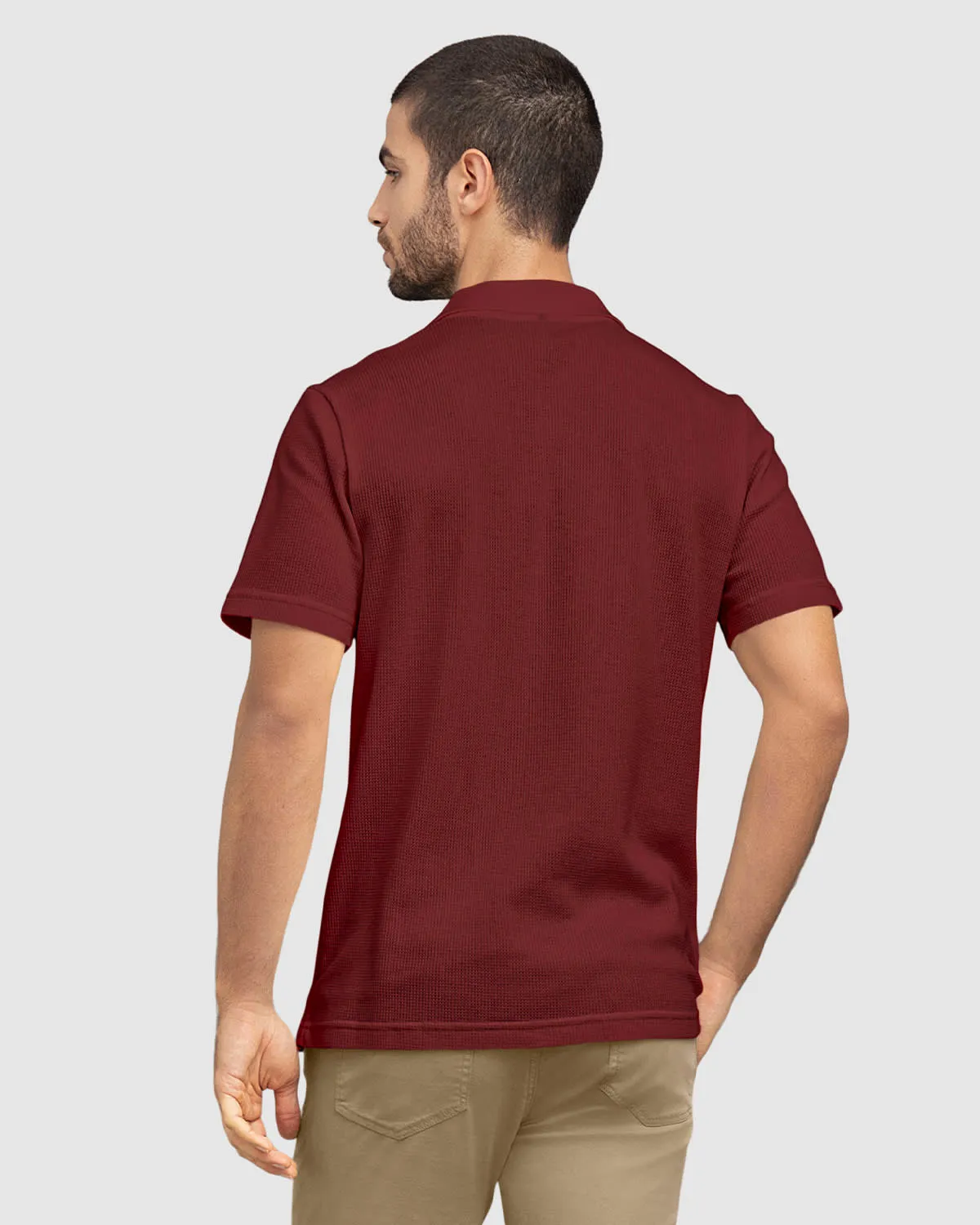 Camiseta tipo polo con bolsillo en frente