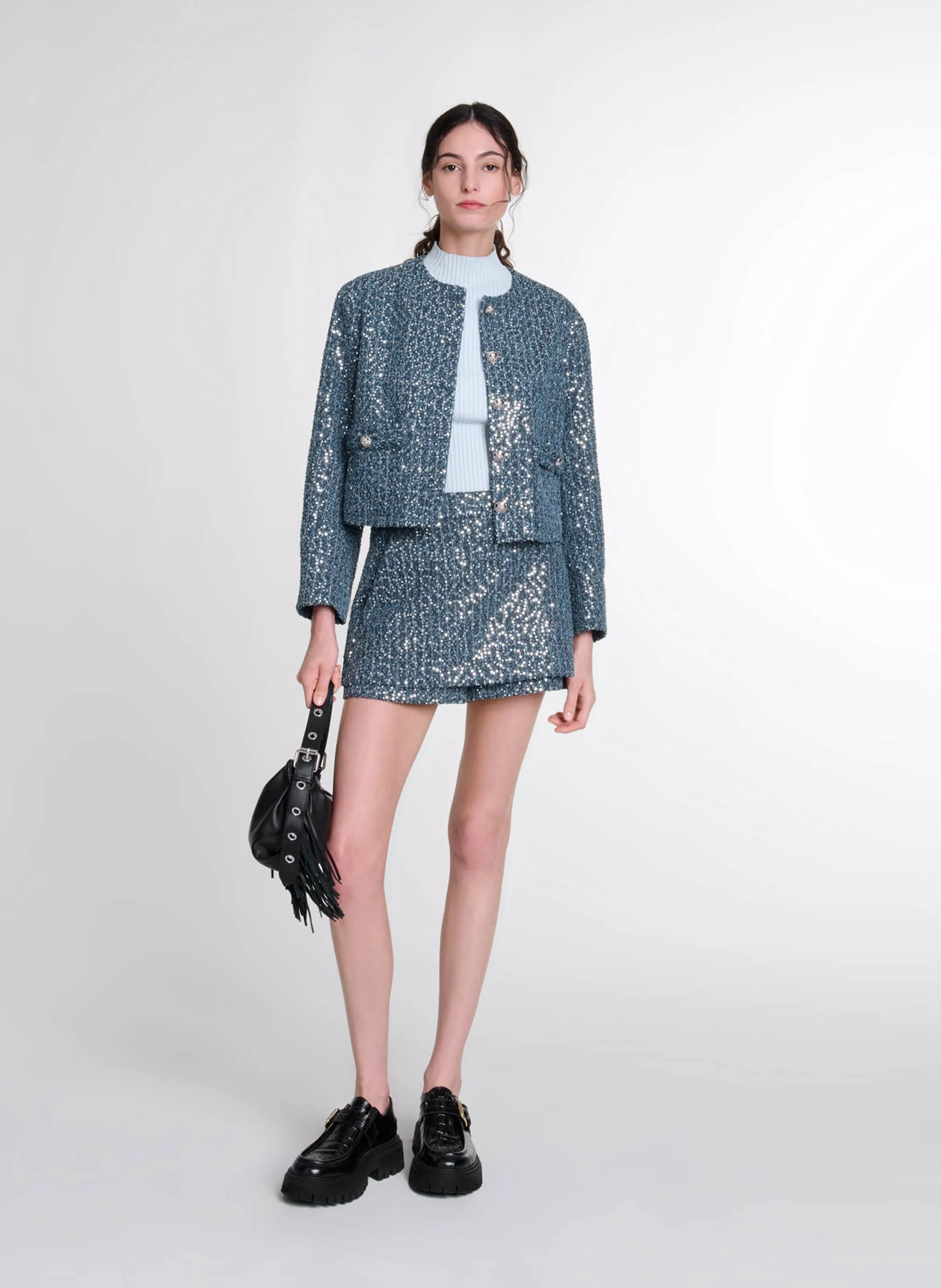 Chaqueta corta de tweed con lentejuelas. en azul