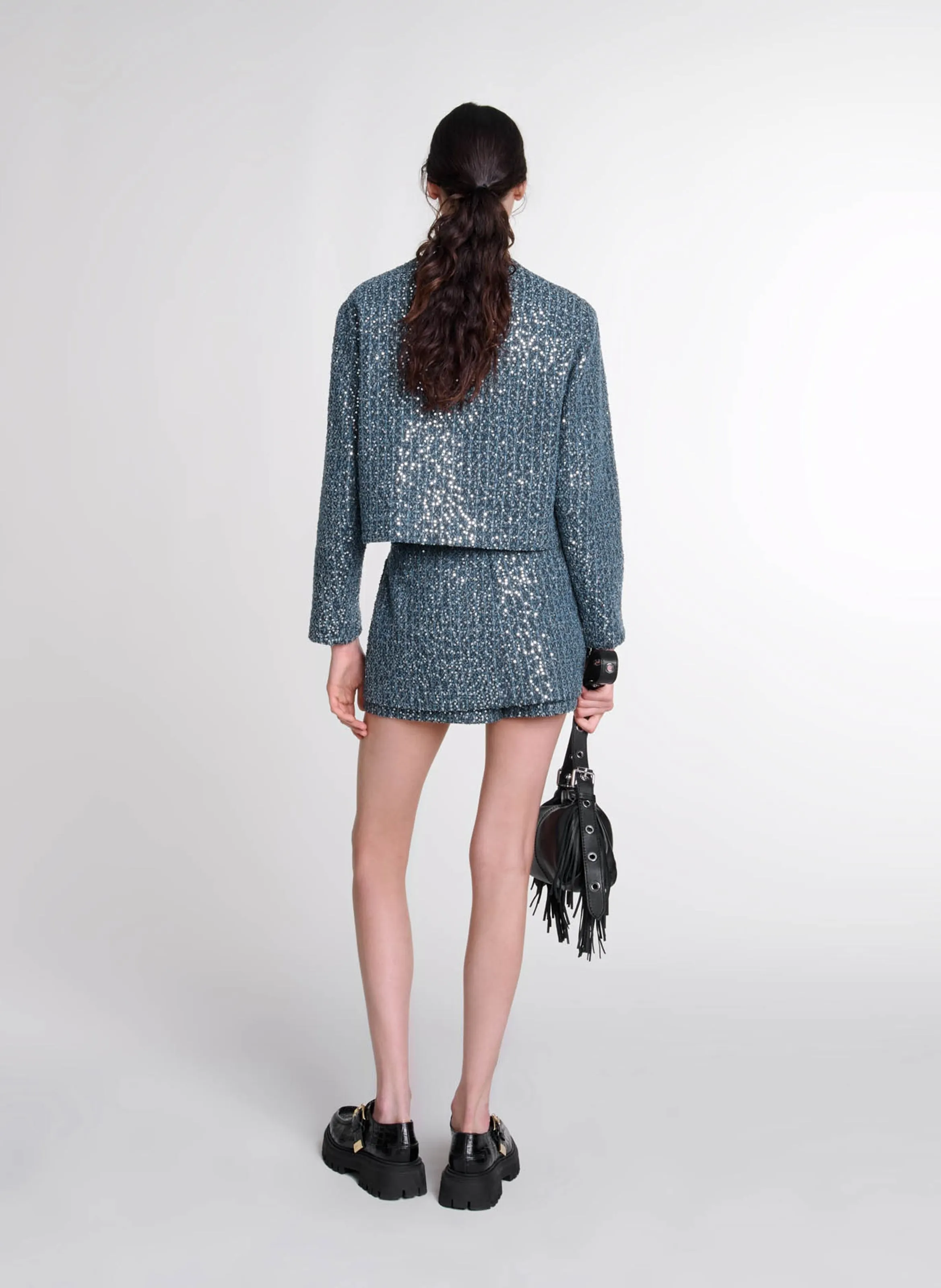 Chaqueta corta de tweed con lentejuelas. en azul