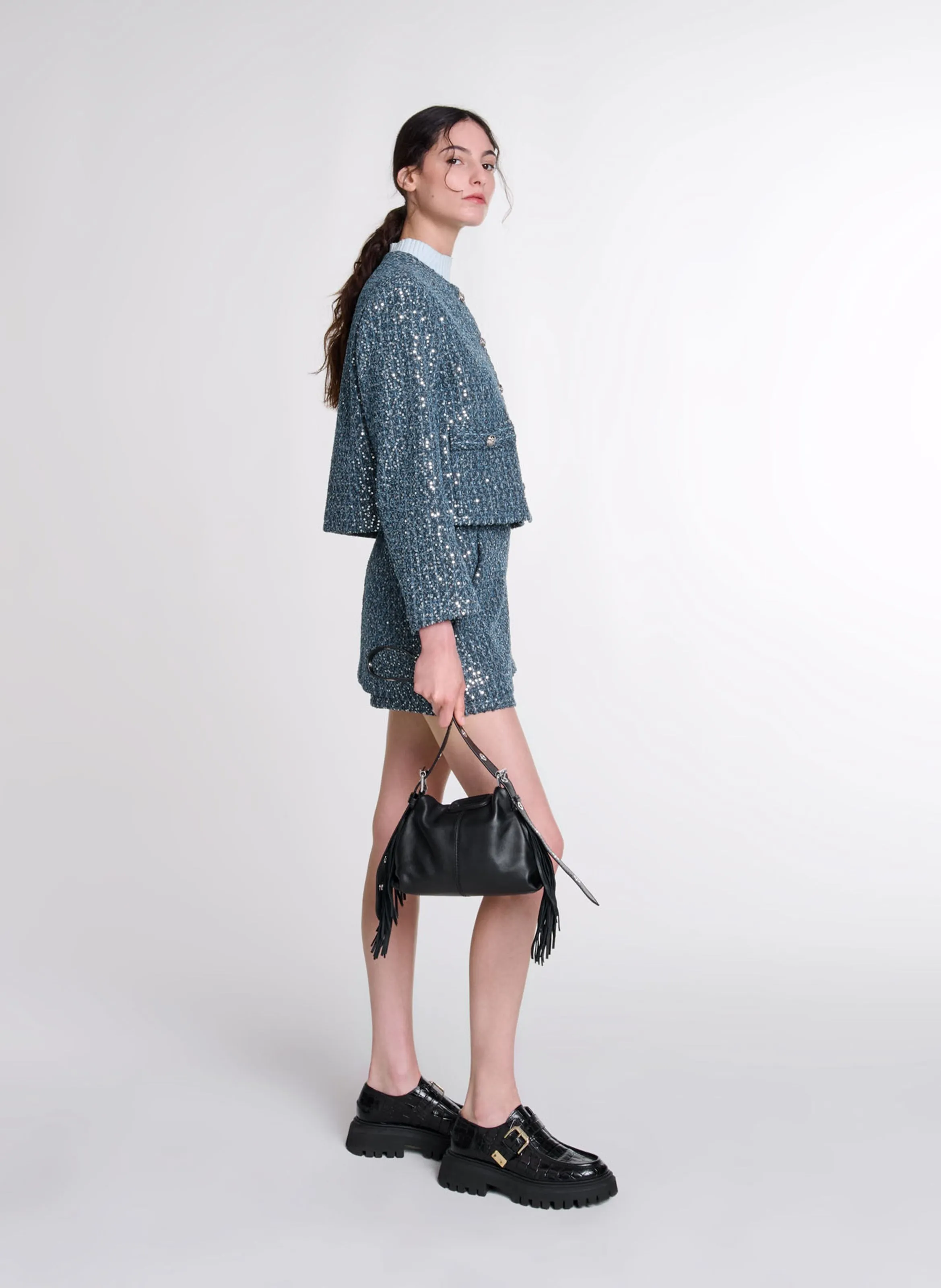 Chaqueta corta de tweed con lentejuelas. en azul