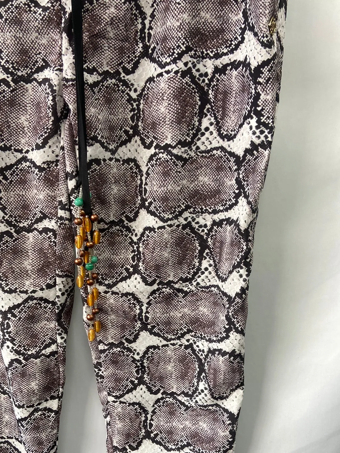 CUPLÉ.Pantalones fluidos animal print T.L