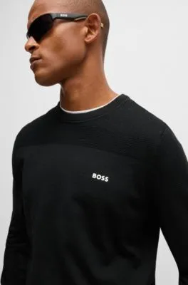 JERSEY DE CUELLO REDONDO CON DETALLE DE LA MARCA EN TEJIDO DRYFLEX