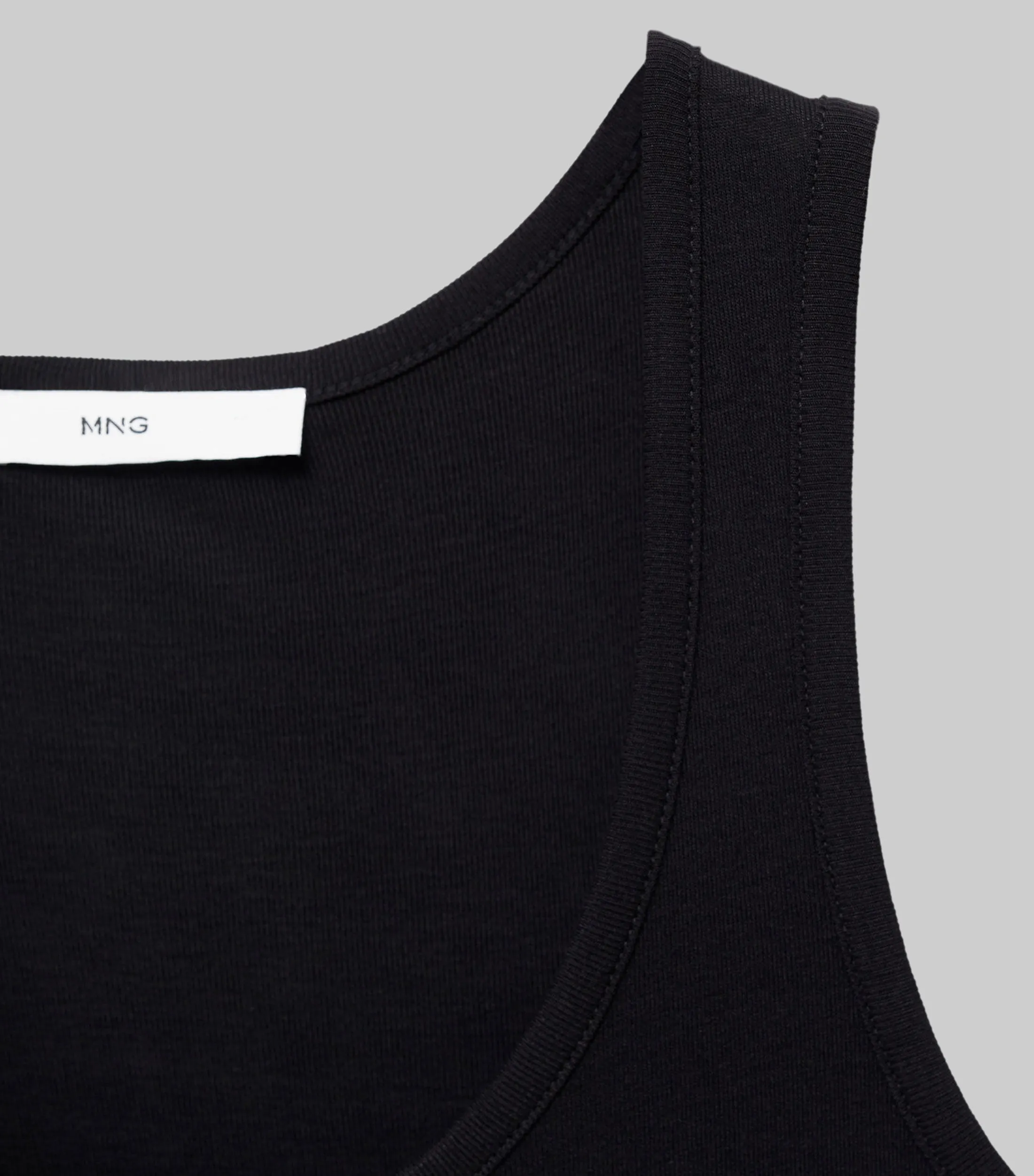Mango Top liso sin mangas Mujer