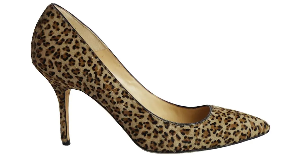 Manolo Blahnik Pointed Pumps en Animal Print Ponyhair Impresión de pitón 