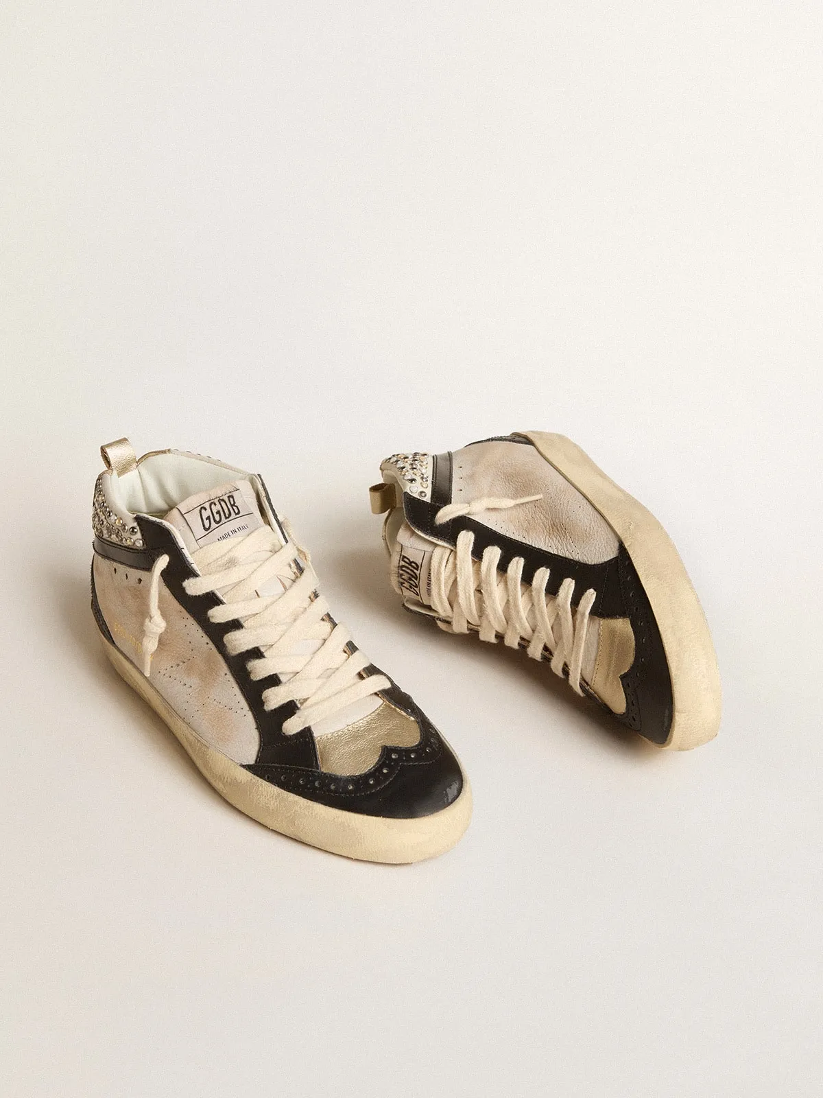 Mid Star LTD de mujer de piel blanca y negra con perlas y estrella perforada
