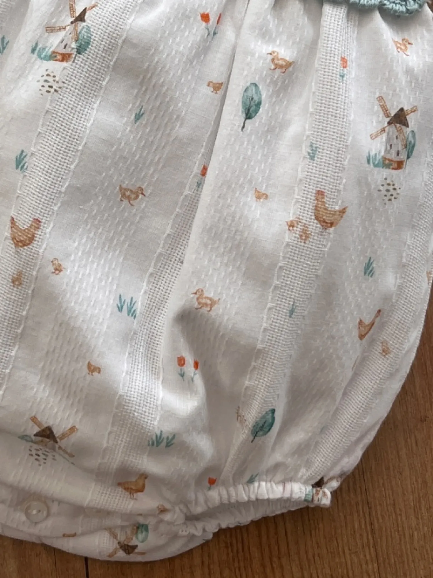 Pelele unisex en punto y tela colección Farm