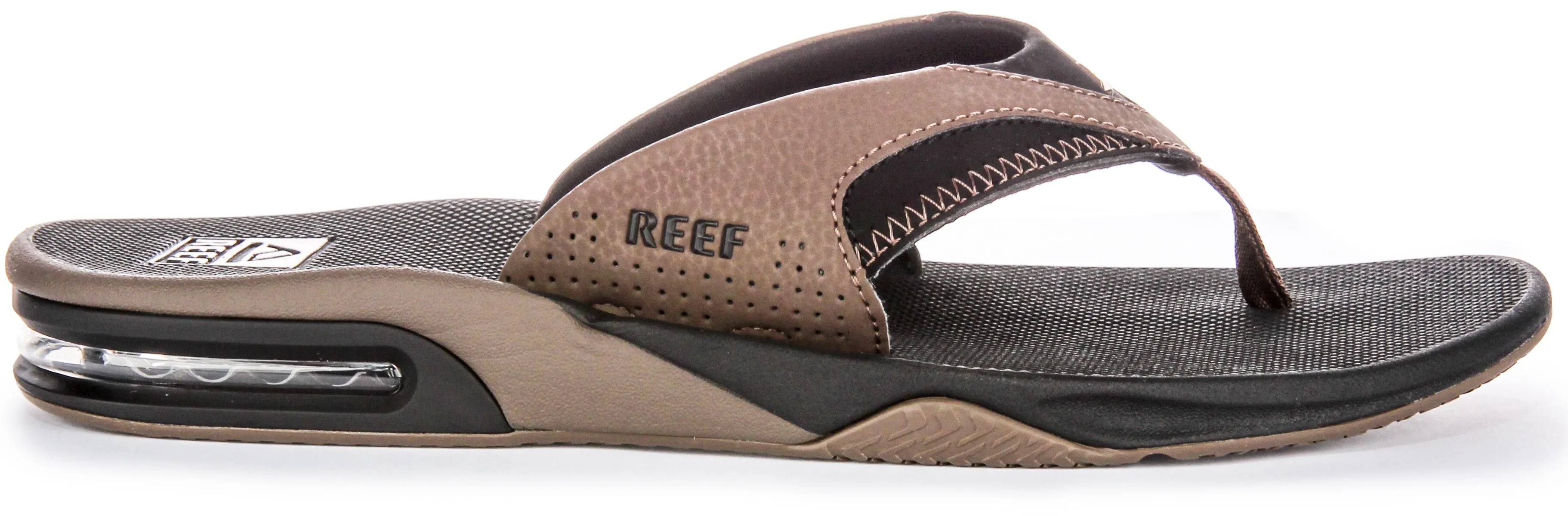 Reef M Fanning Bottle Opener Sandalias de cuero nobuck para hombre en color marrón negro