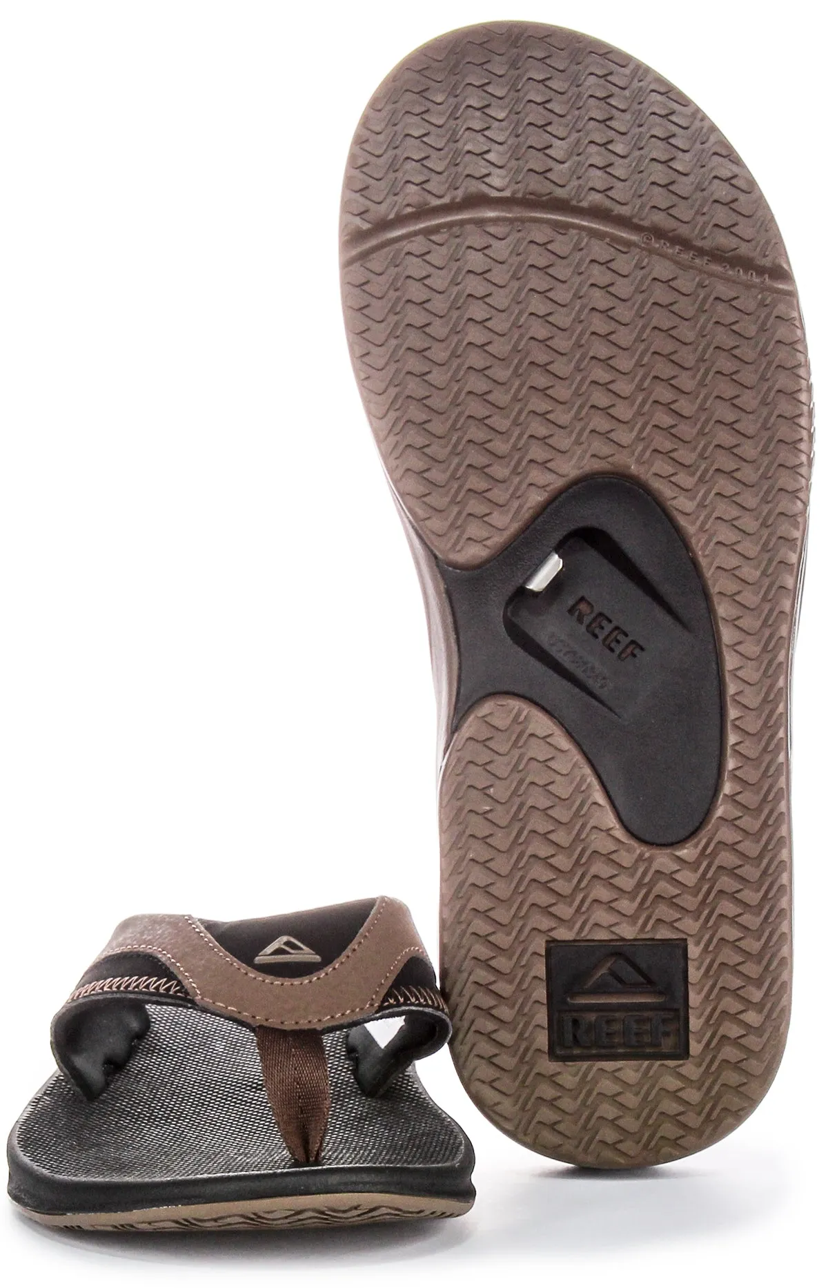 Reef M Fanning Bottle Opener Sandalias de cuero nobuck para hombre en color marrón negro