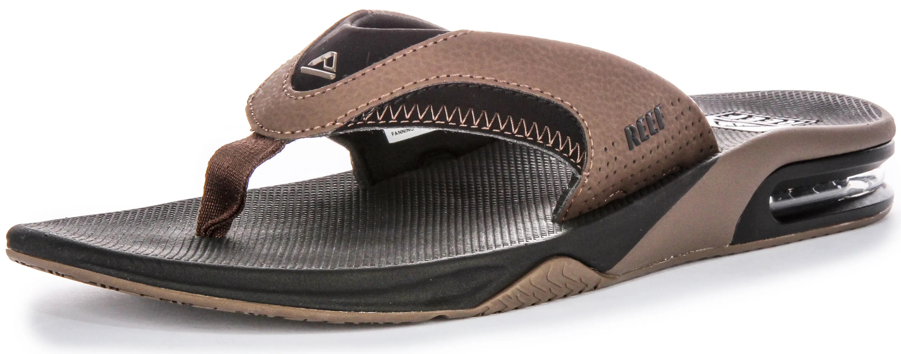 Reef M Fanning Bottle Opener Sandalias de cuero nobuck para hombre en color marrón negro