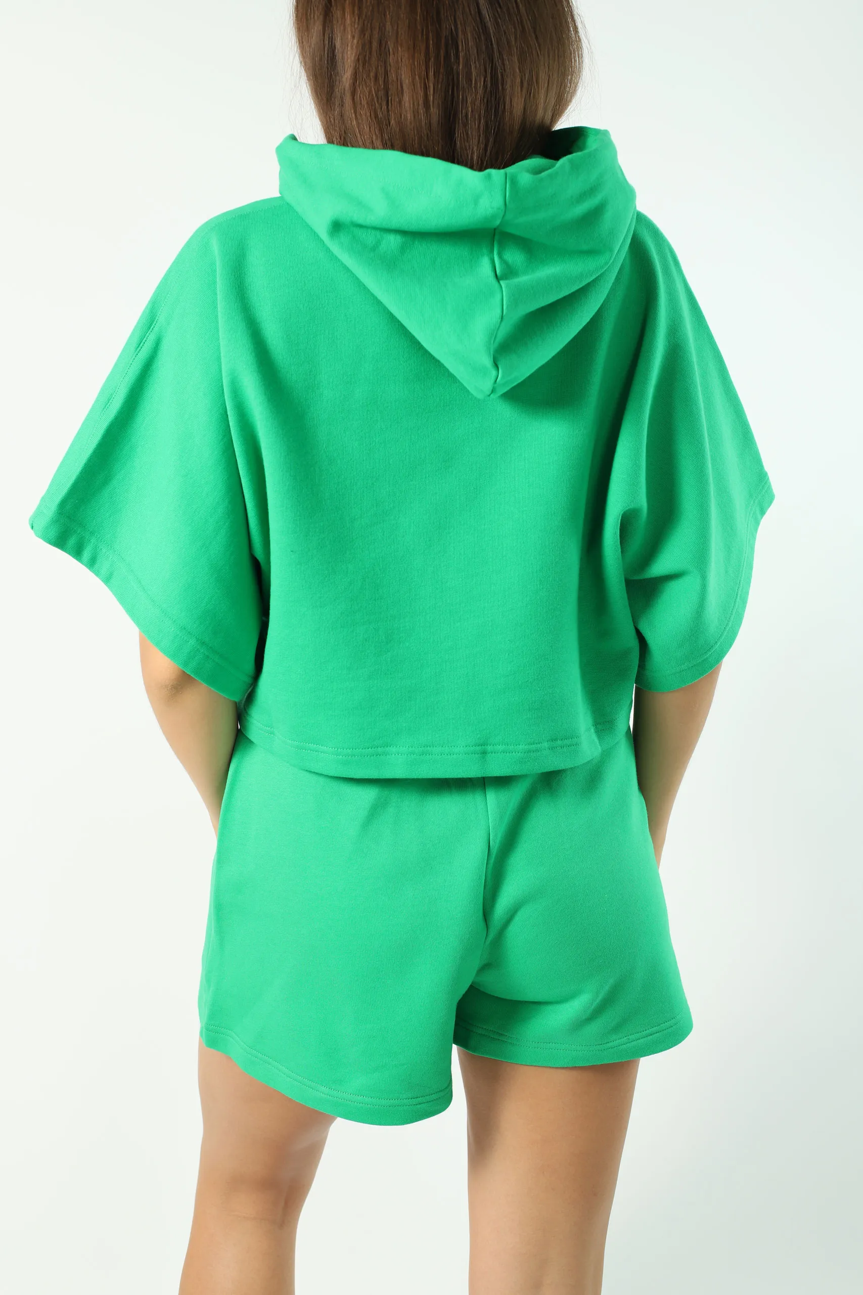 Sudadera manga corta verde con capucha y logo ojo y estrella