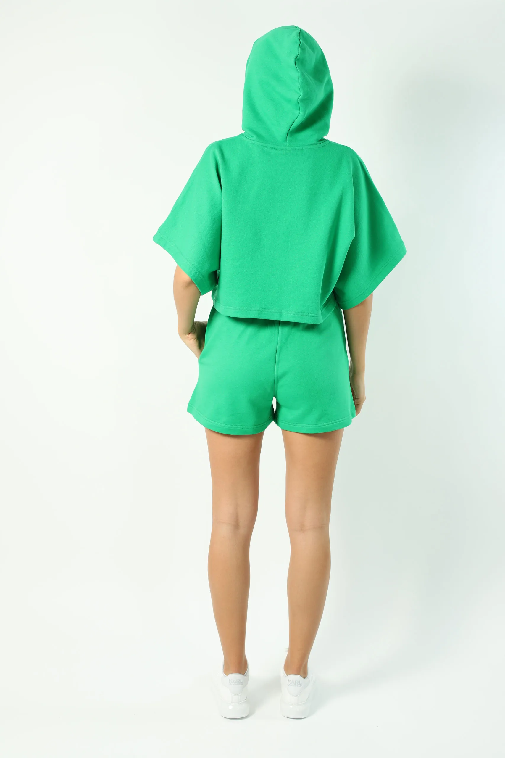 Sudadera manga corta verde con capucha y logo ojo y estrella